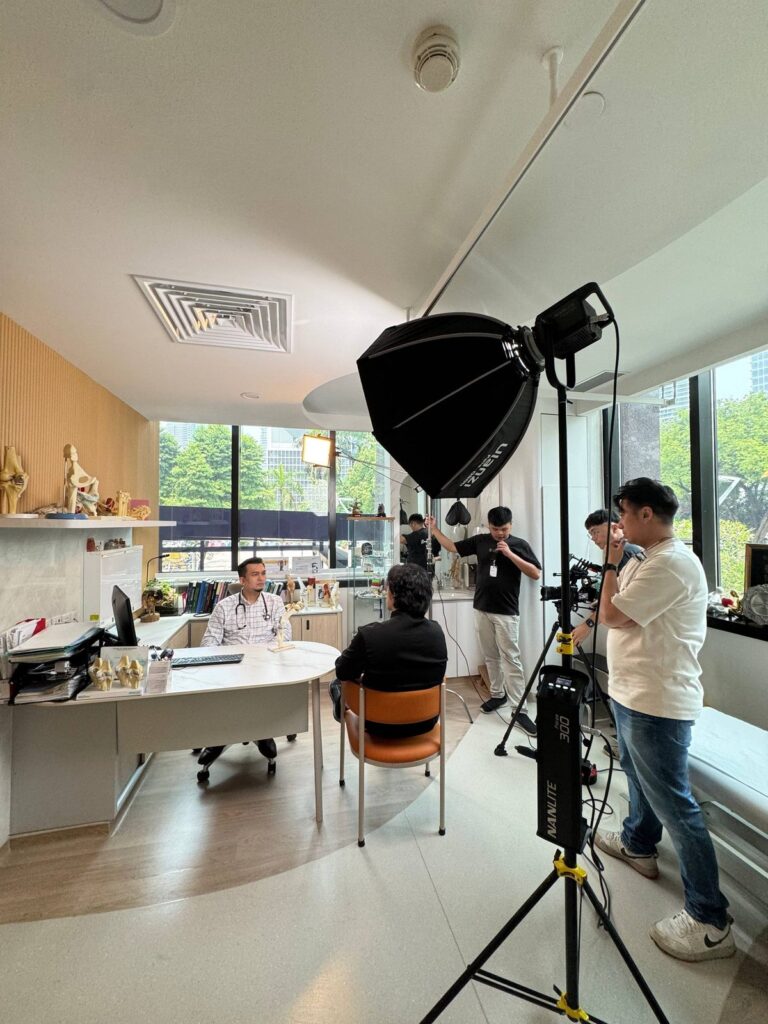 The crew films a consultation in the clinic